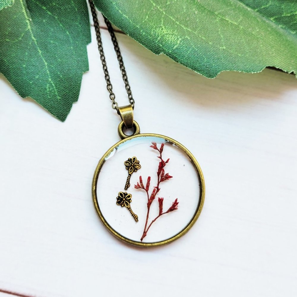Pendant Necklace w Pressed Dried Florals and Floating Skelton Keys Maroon Bronze